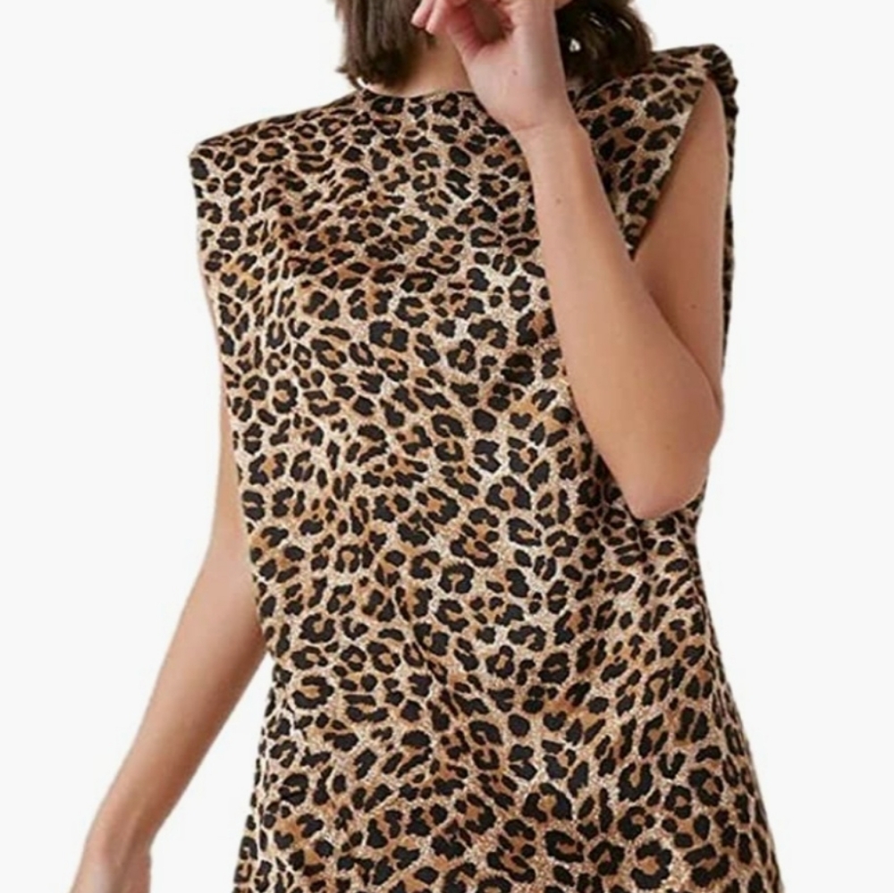 Sleeveless shoulder pad dress